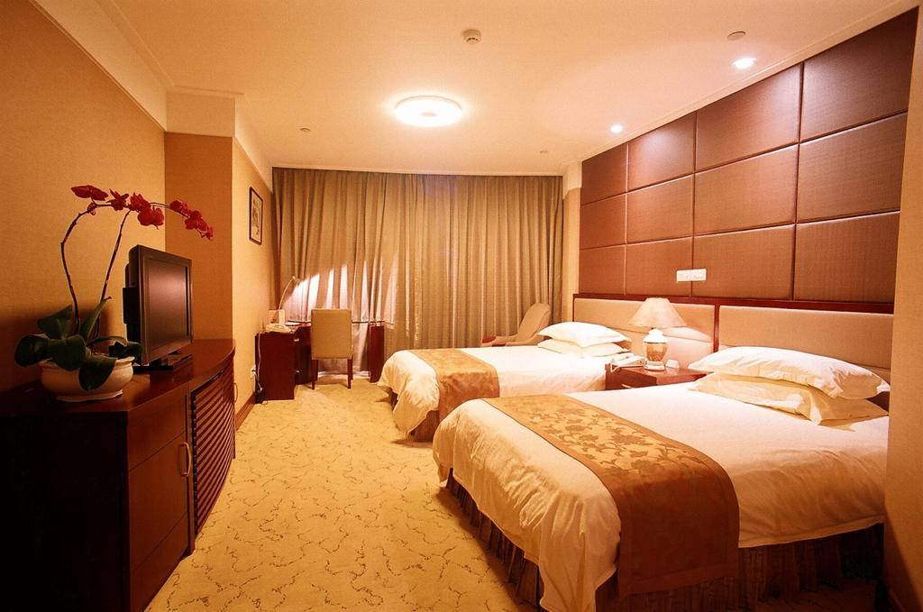 Shanghai Hengsheng Peninsula International Hotel Kamer foto